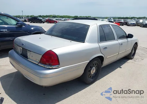2009 Ford Crown Victoria Police/Police Interceptor z USA, uszkodzony, nr VIN 2FAHP71V29X102762